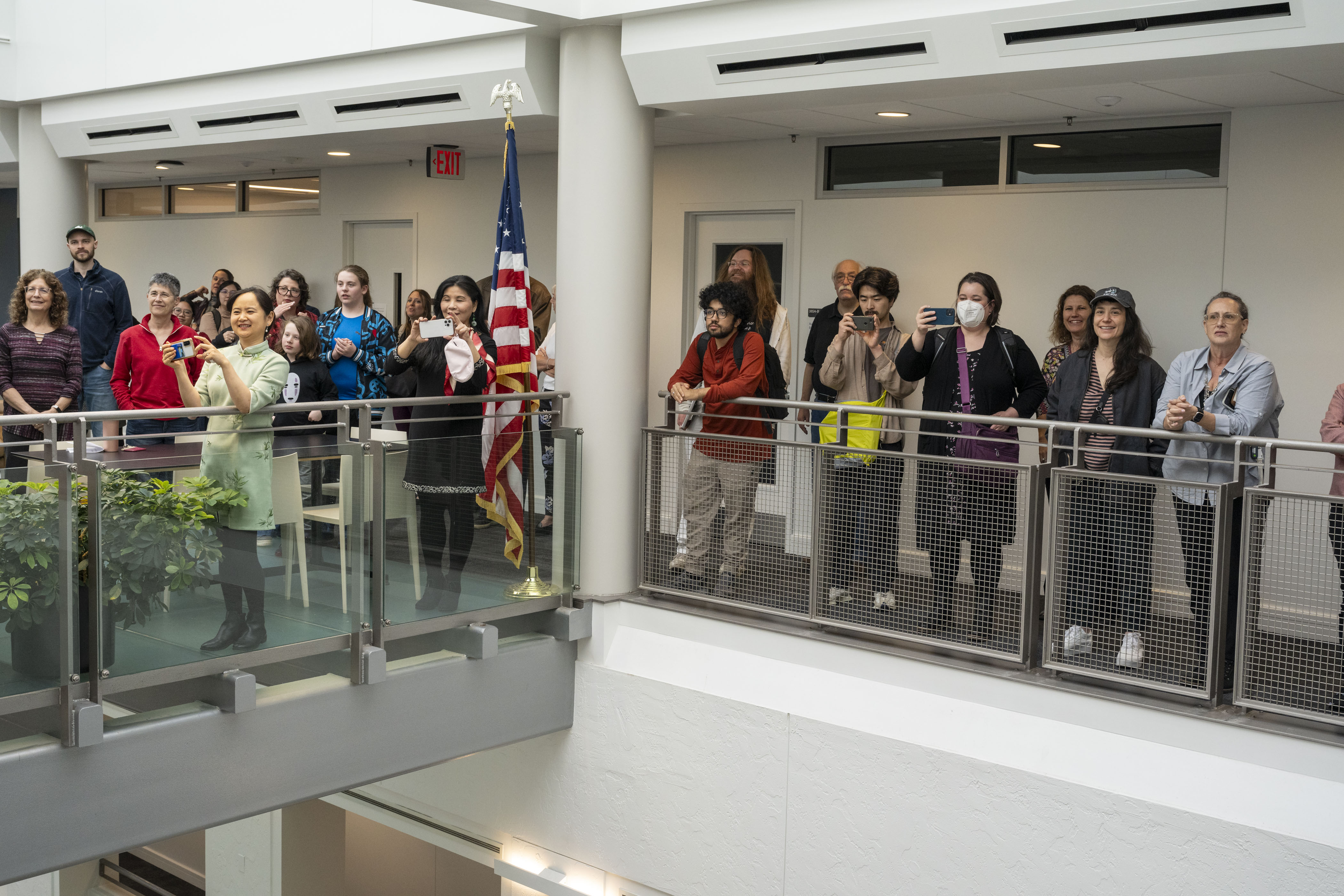 Attendees gather for the unveiling of "In the Footsteps of a Stranger"
