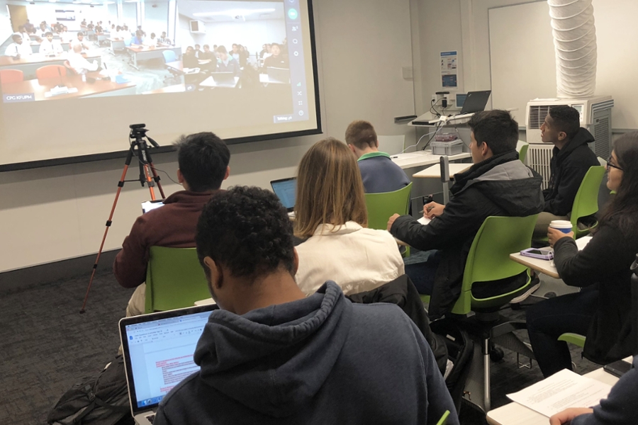 CMU students in classroom participating in virtual exchange session