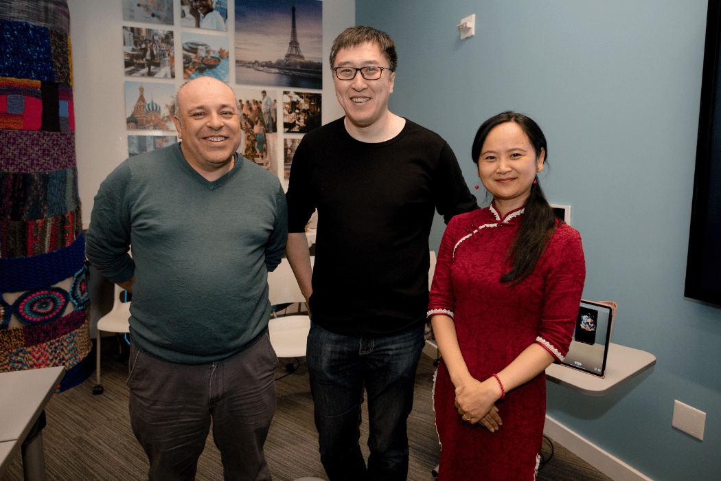 Stephan Caspar, Gang Liu, and Haixia Wang pose for a photo