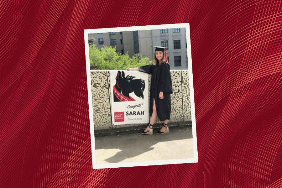 Sarah Klotz wears a cap and gown at her graduation in 2020