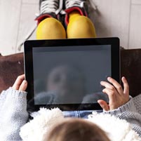 A child uses a tablet