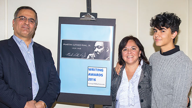 uhail Gharaibeh-Gonzalez, far right, stands with his parents at the 2016 Martin Luther King, Jr. Writing Awards ceremony.