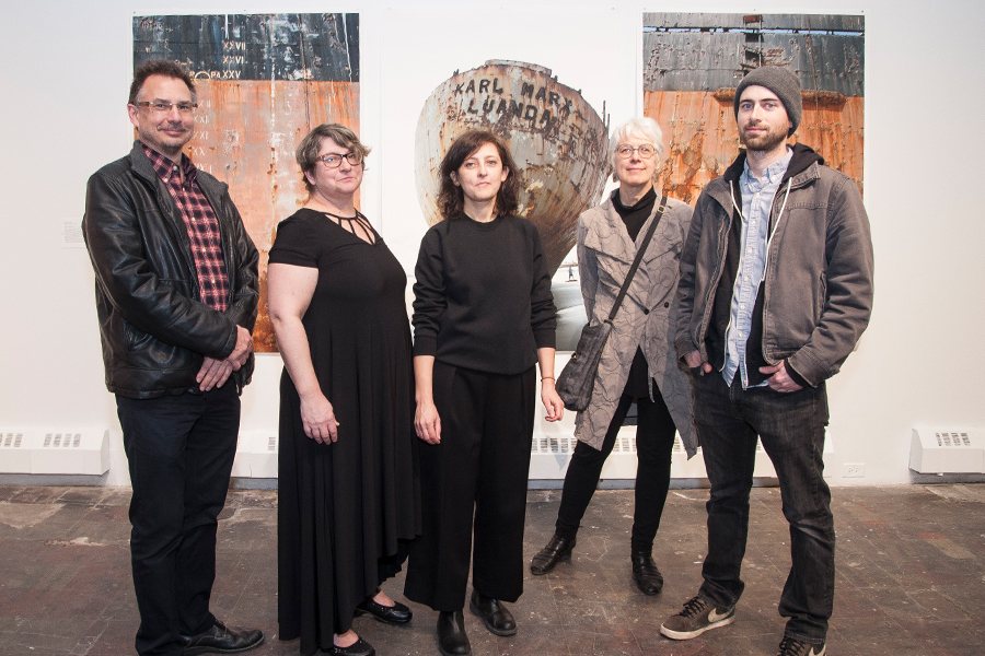 Marx@200 curators Kathy Newman (second from left) and Susanne Slavick (second from right) with artists (from left to right), Andrew Ellis Johnson, Slinko and Blake Fall-Conroy in front of Kiluanji Kia Henda's 