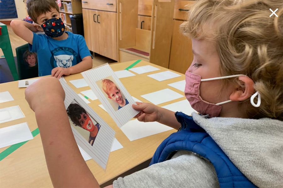 Children wearing masks, playing Friend Matching