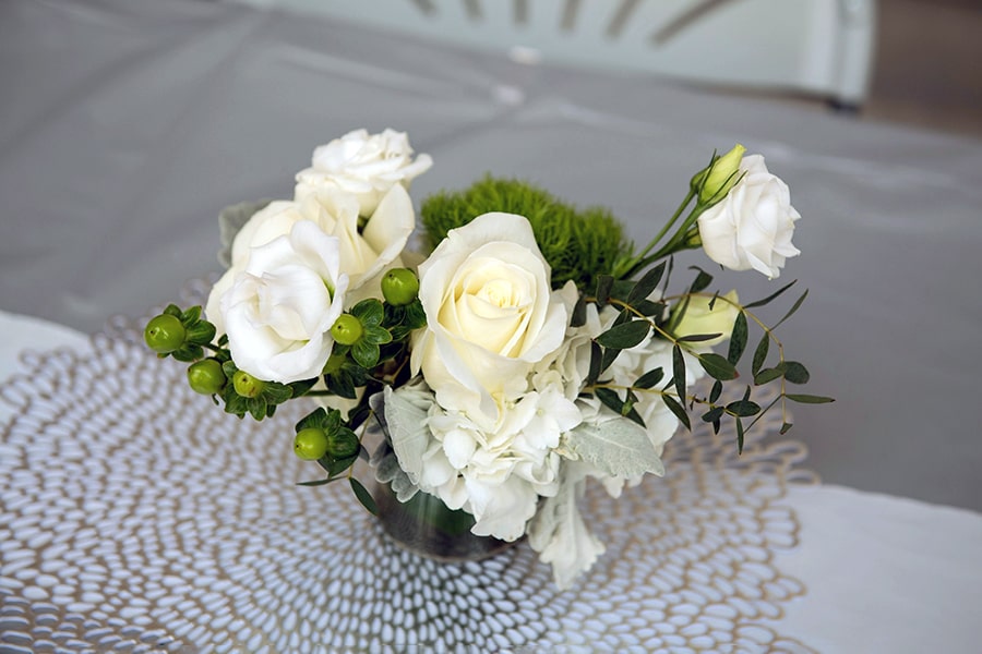 A white flower bouquet on a table