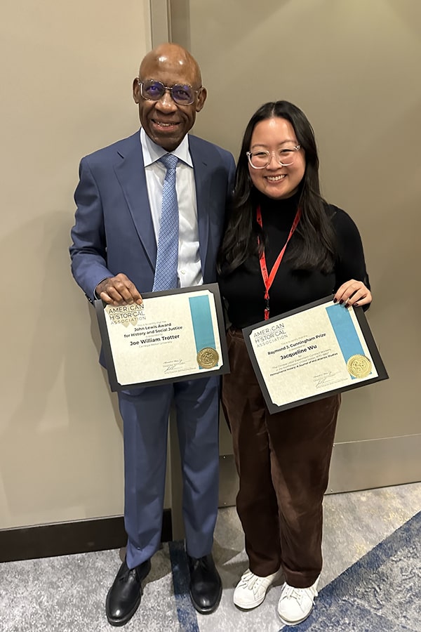 Wu and Trotter holding awards from American Historical Association