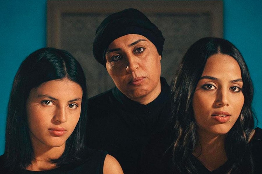 Four Daughters: Olfa Hamrouni alongside her daughters. Credit: Kino Lorber