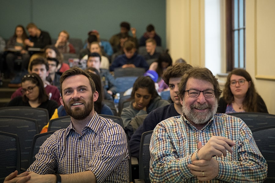 Kody Manke-Miller and Mark Kamlet sit with the Inequality class