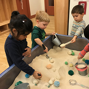Children playing in a sand box
