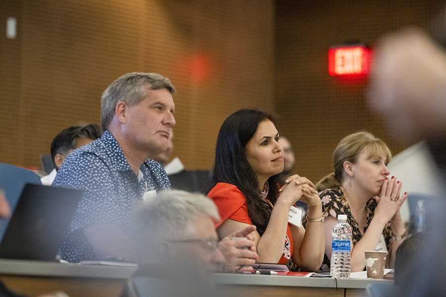 Attendees listening to a speaker