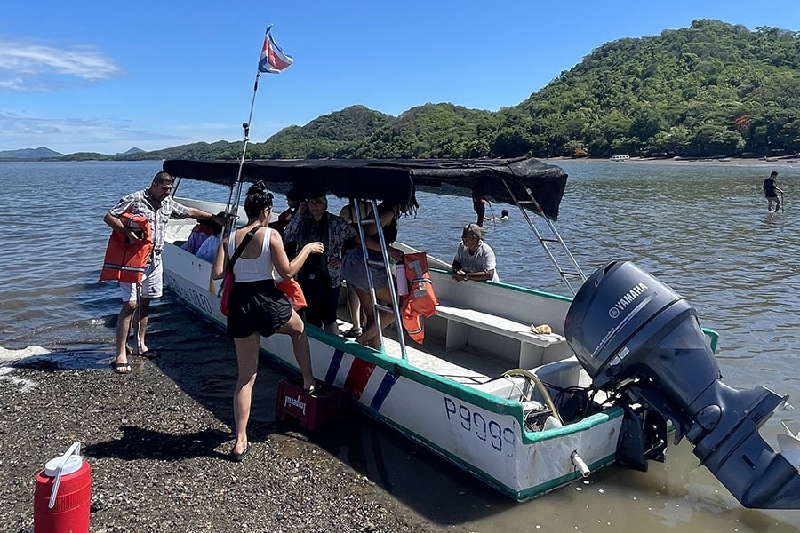 A boat with students on the shore in Costa Rica