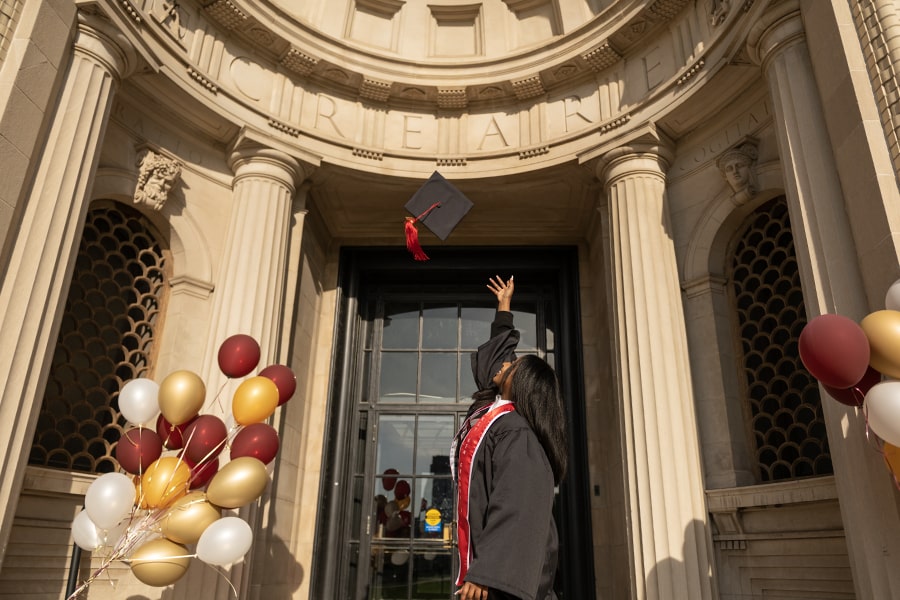 A First Gen student celebrates their graduation