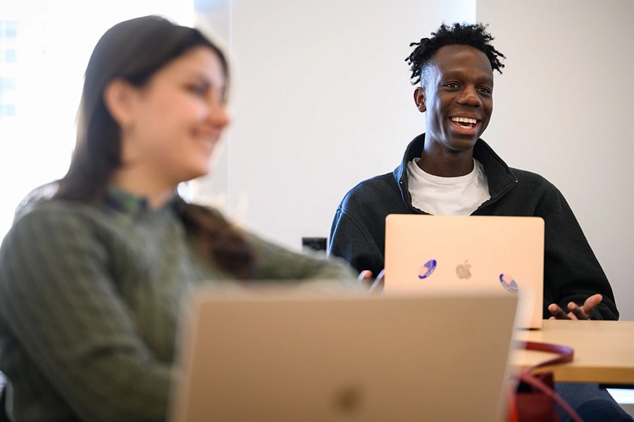 students participating in a classroom discussion