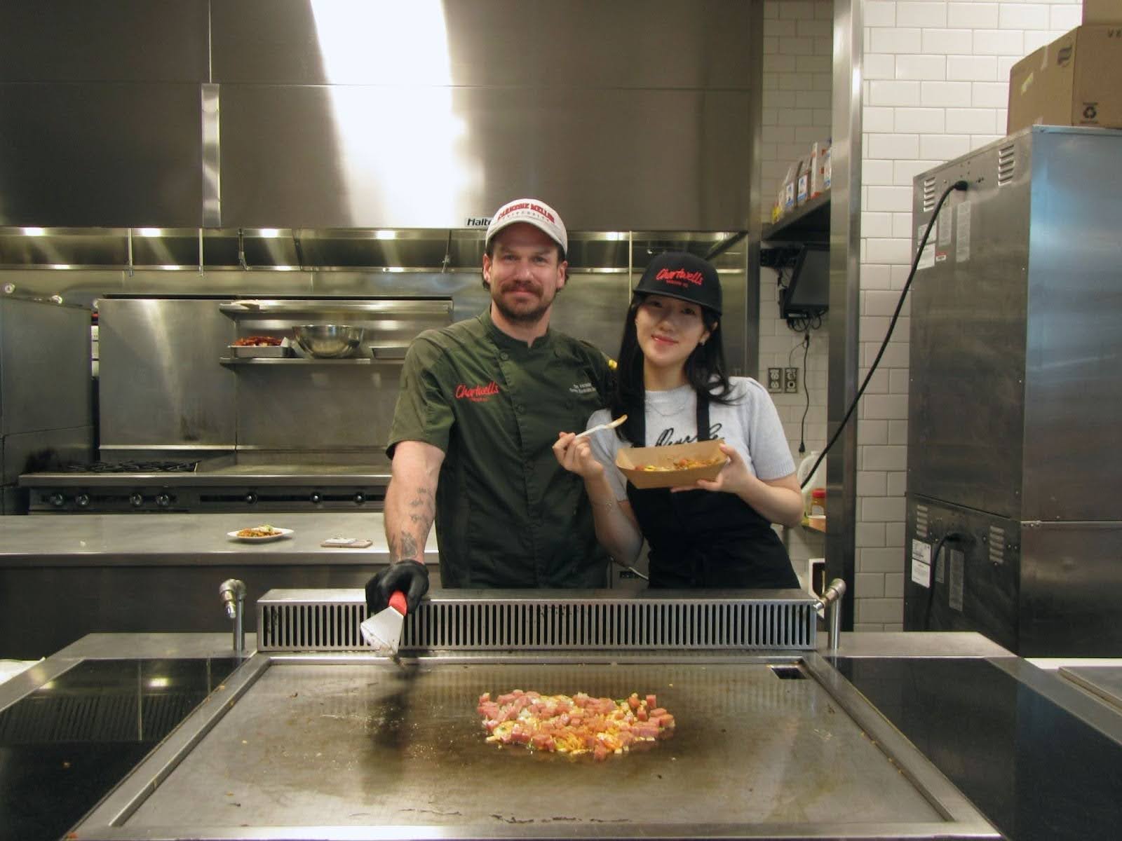 campus chef and student in on campus kitchen