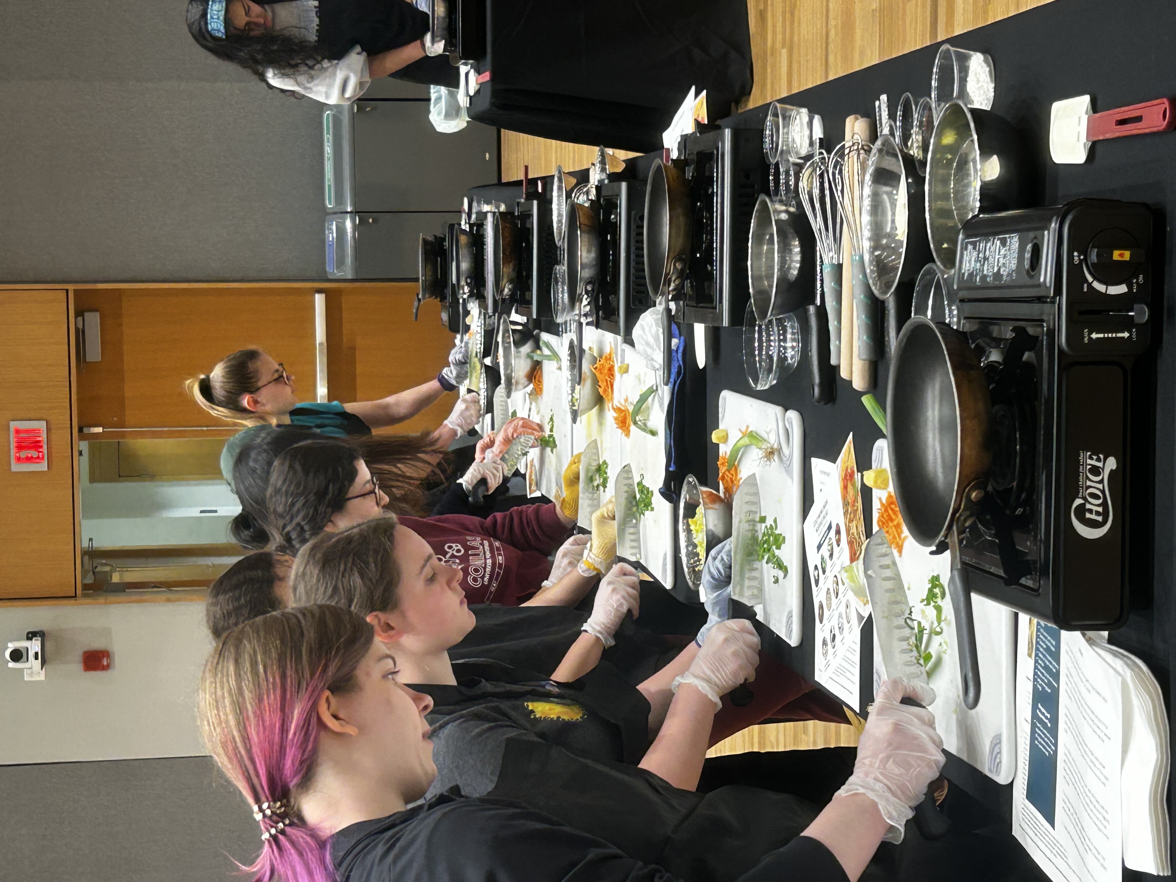 CMU students cooking at event