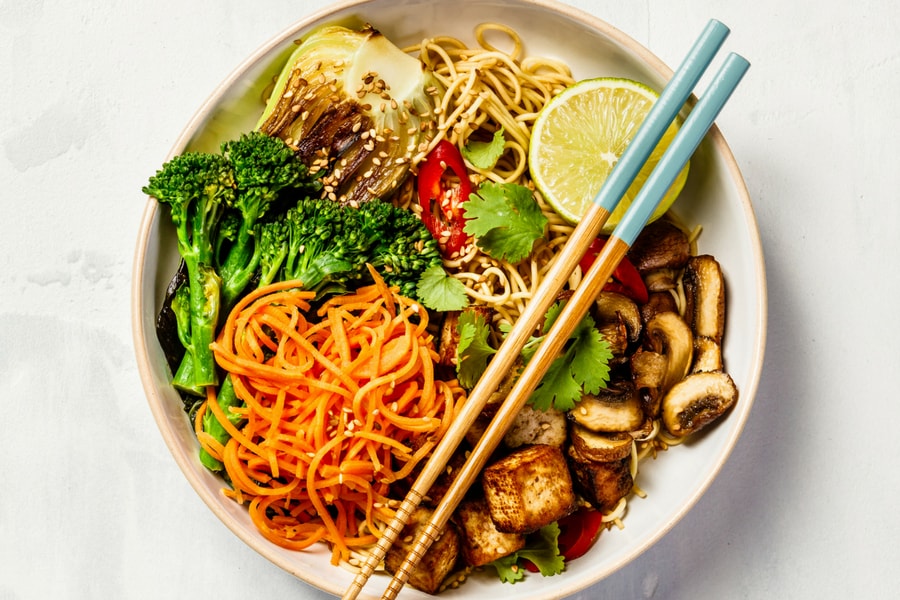 Asian-inspired bowl of noodles and vegetables