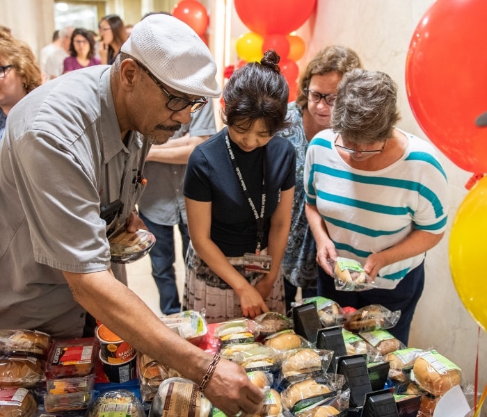 Attendees sampling new items