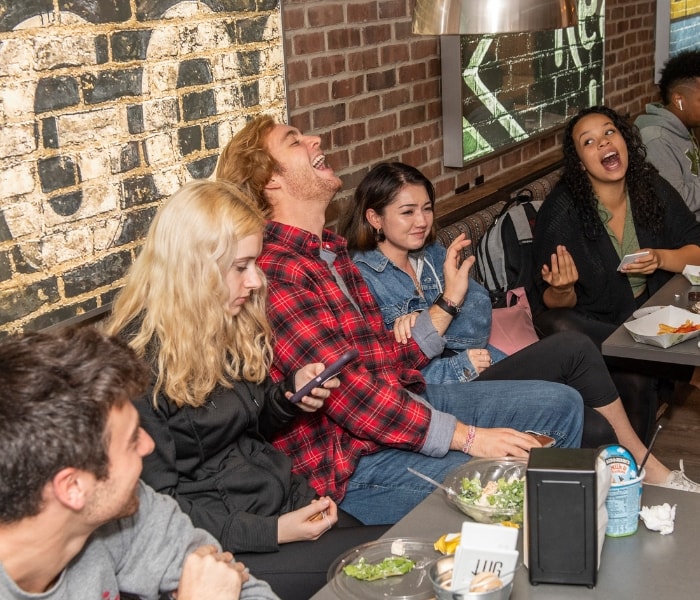 students eating and socializes