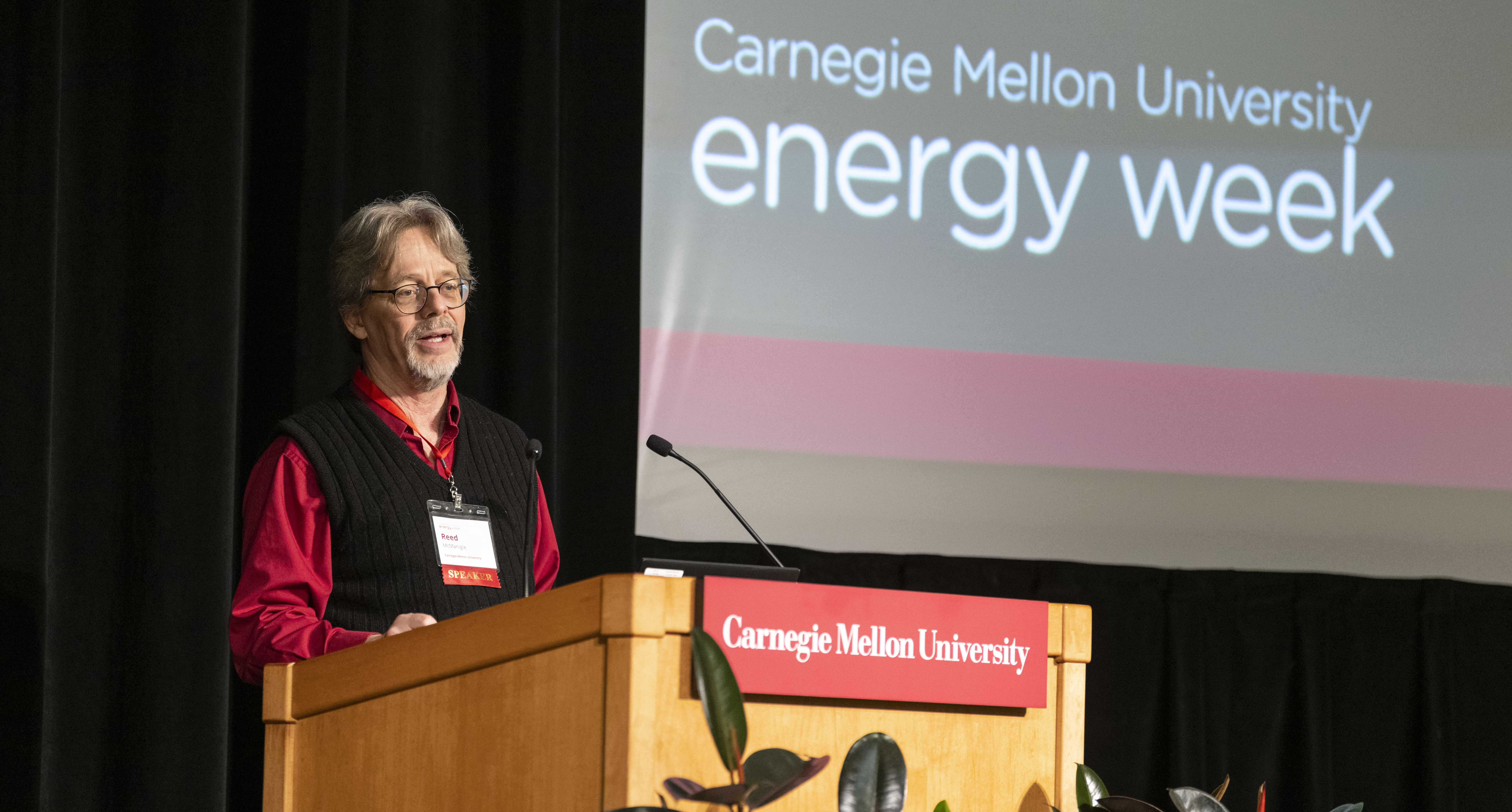 Reed McManigle at podium talking during Energy Week 2023