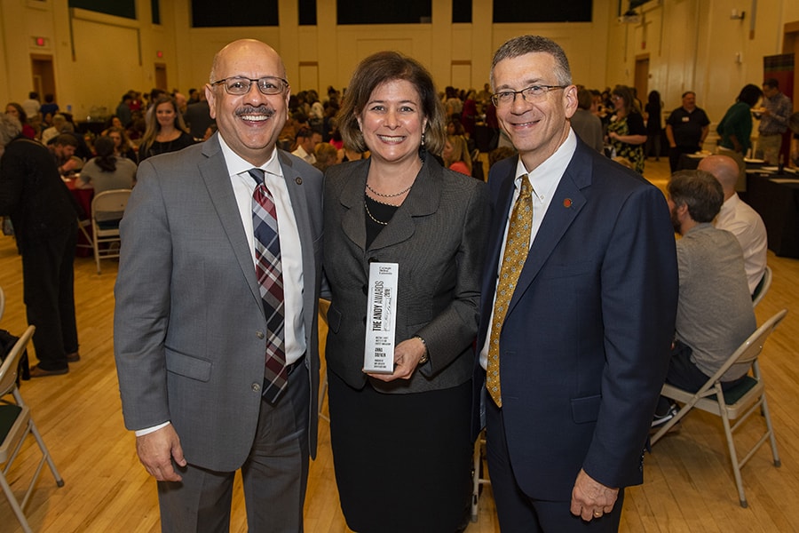 Executive Director Anna Siefken stands with CMU President Farnam Jahanian and College of Engineering Dean Jim Garett at the 2018 Andy Awards.