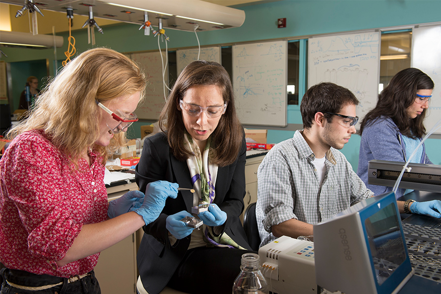 CMU Professor Meagan Mauter working in her lab with students