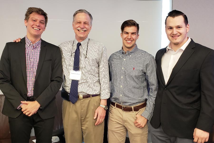 Patrick Dykiert, Paul Fischbeck, Connor Cipp and Nick Chmielewski after presenting on decreasing lead levels in Allegheny County.