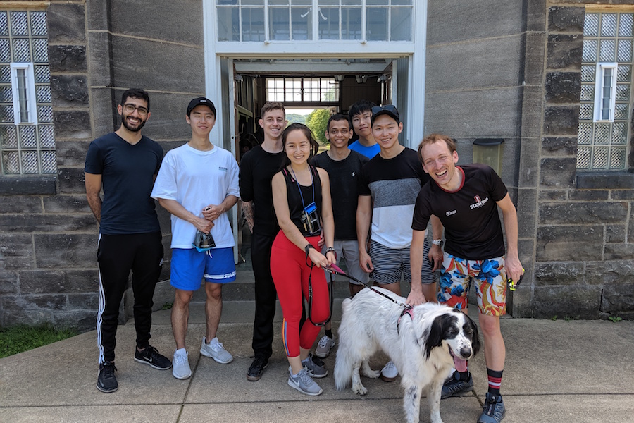 Ulissi with his research group...and mascot Laika.