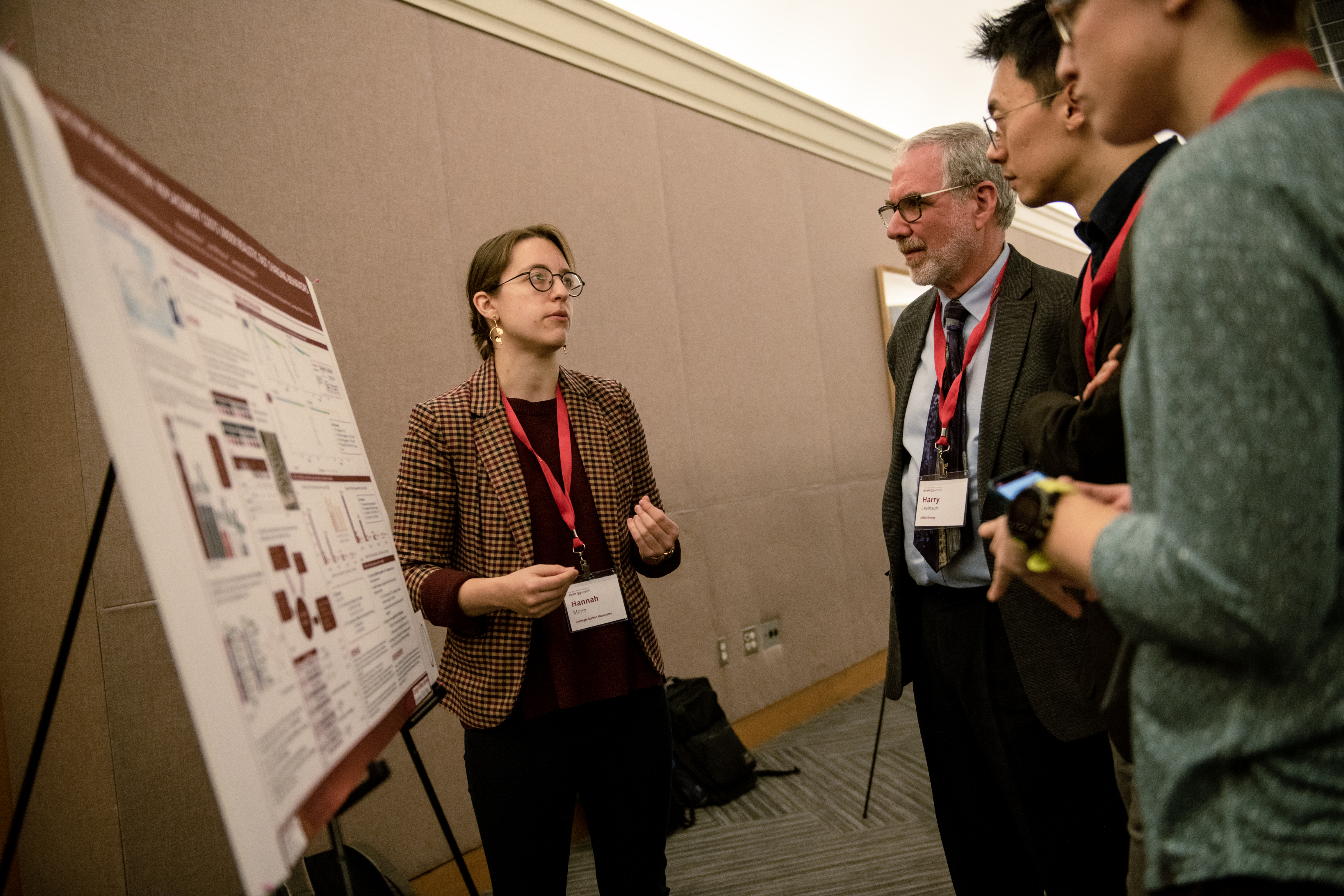 Student Presents Poster to Judges in Cohon Center
