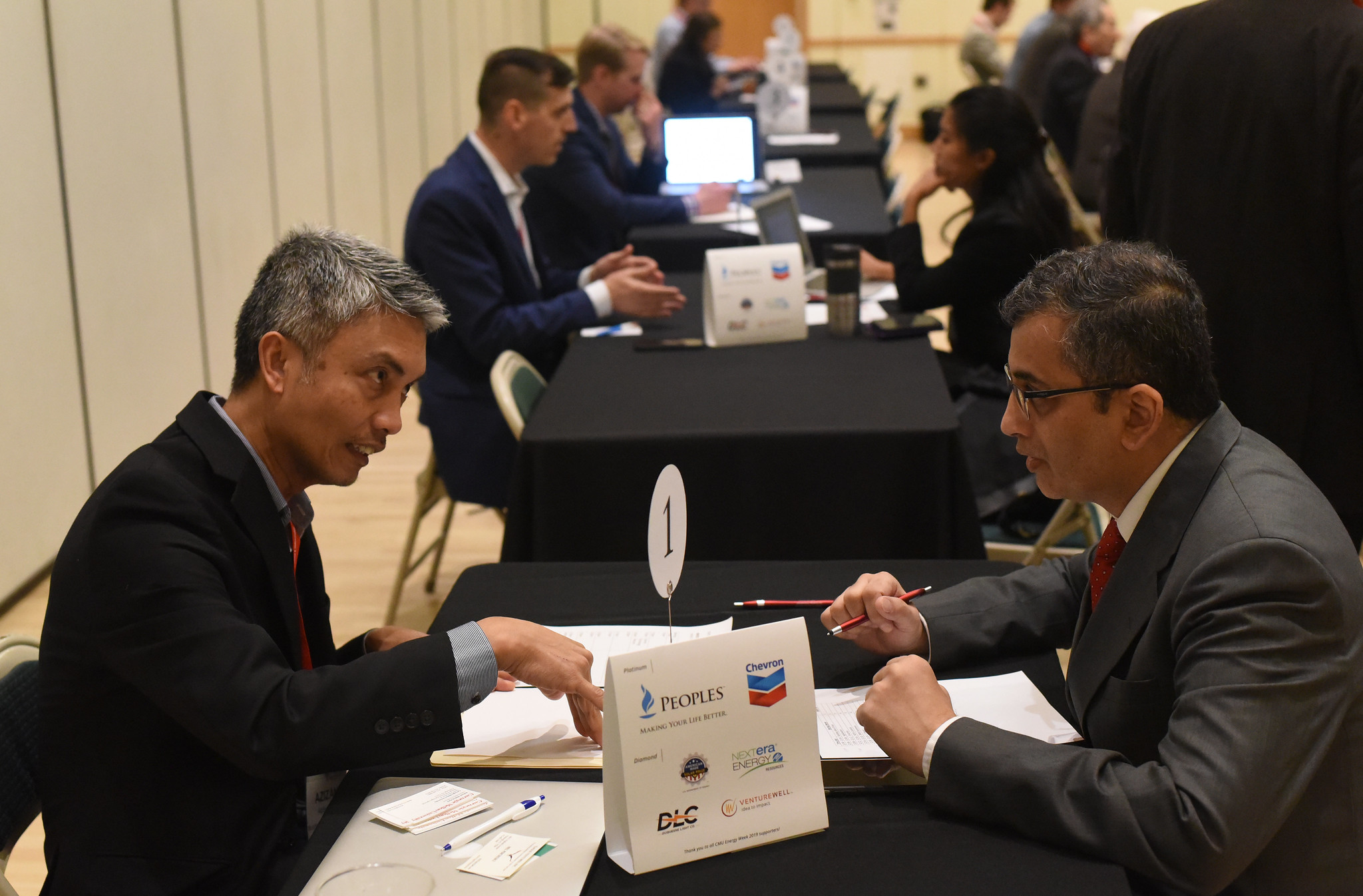 Azizan-Aziz talking to an investor during CMU Energy Week Investor Forum