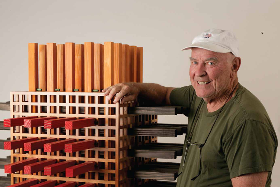 Alumnus Frank Collins with his artwork