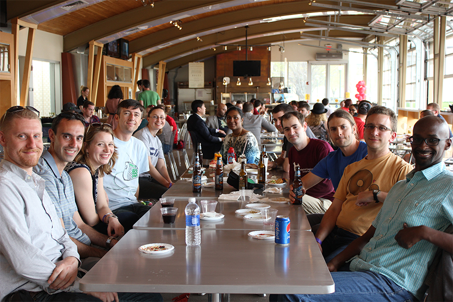 Reunion Attendees at Table on Campus