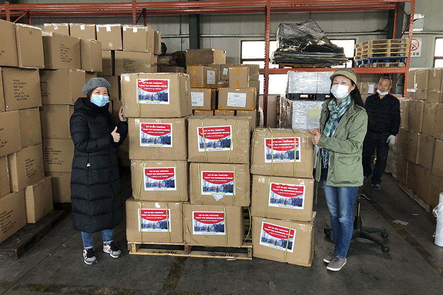 Volunteers packing donations