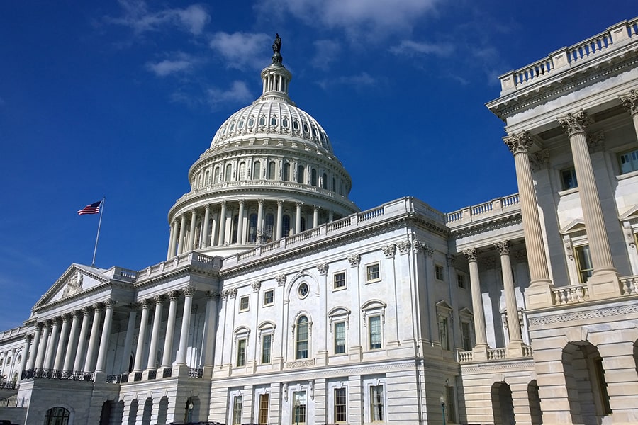 Picture of The United States Capitol with a blue sky background