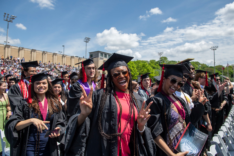 Students celebrating during graduation ceremony