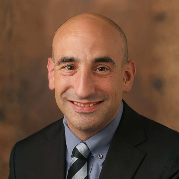 Man with dark grey suit