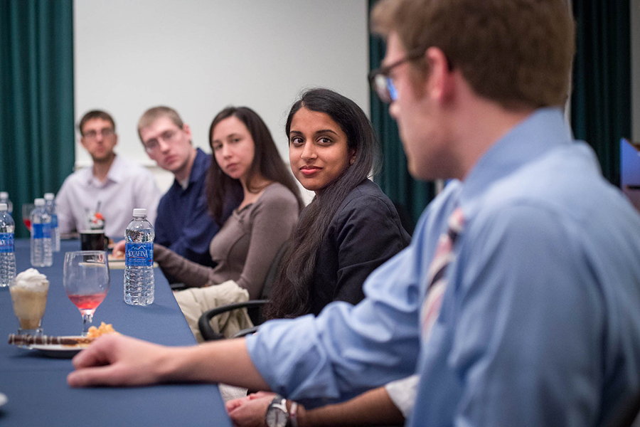 Photo of a student talking to a career adviser and smiling