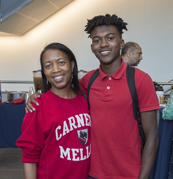 photo of a student and his parent