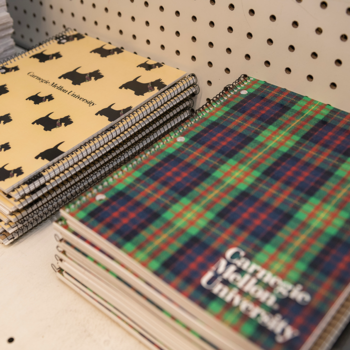 notebooks on a shelf