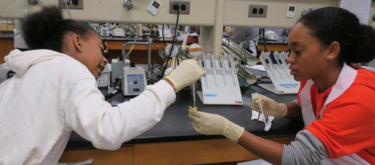Two students working in a CMU lab