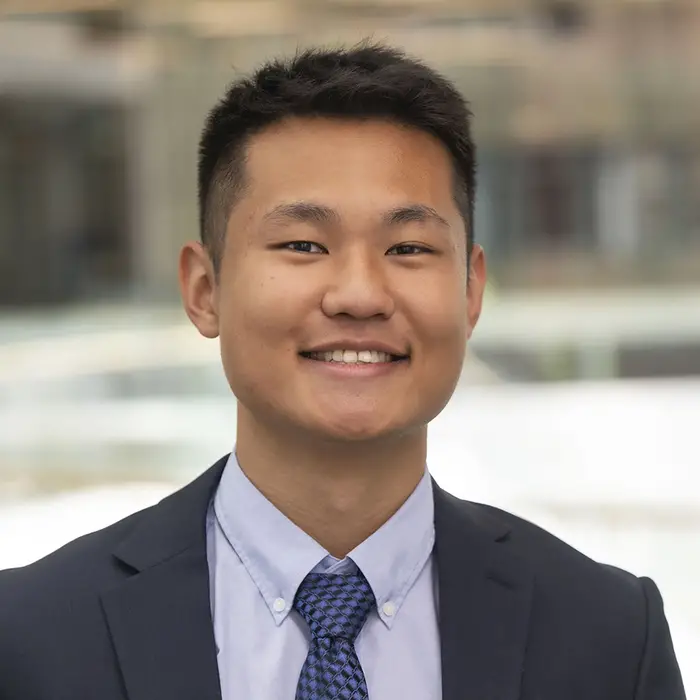 Eric Zhao's headshot. 