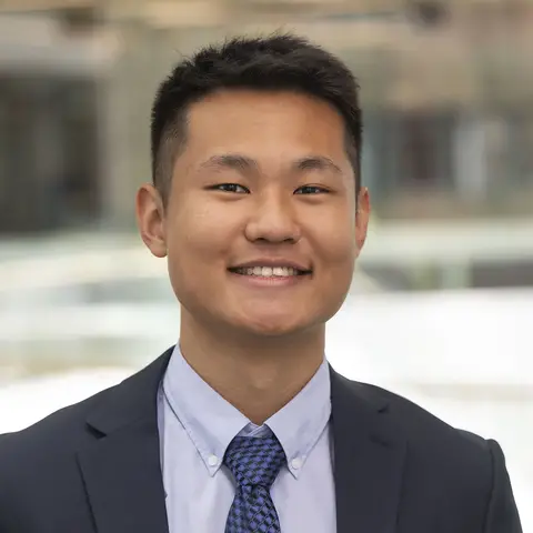 Eric Zhao's headshot. 