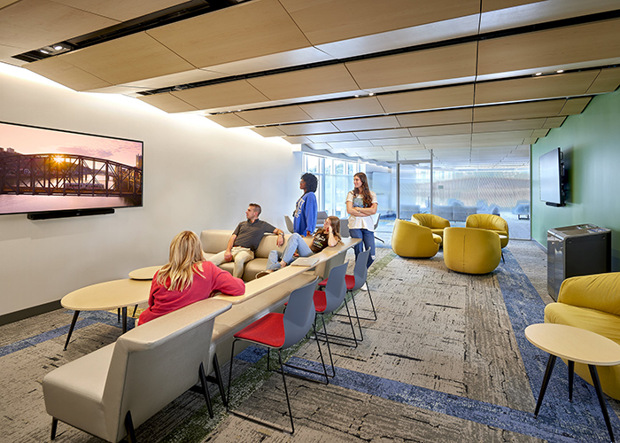 forbes beeler tv room with students sitting on a couch watching tv