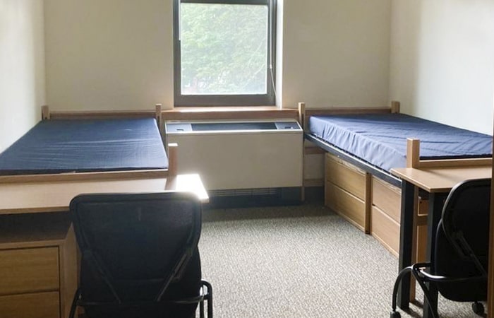 Stever House Double showing two beds, two desks and chairs, and dressers