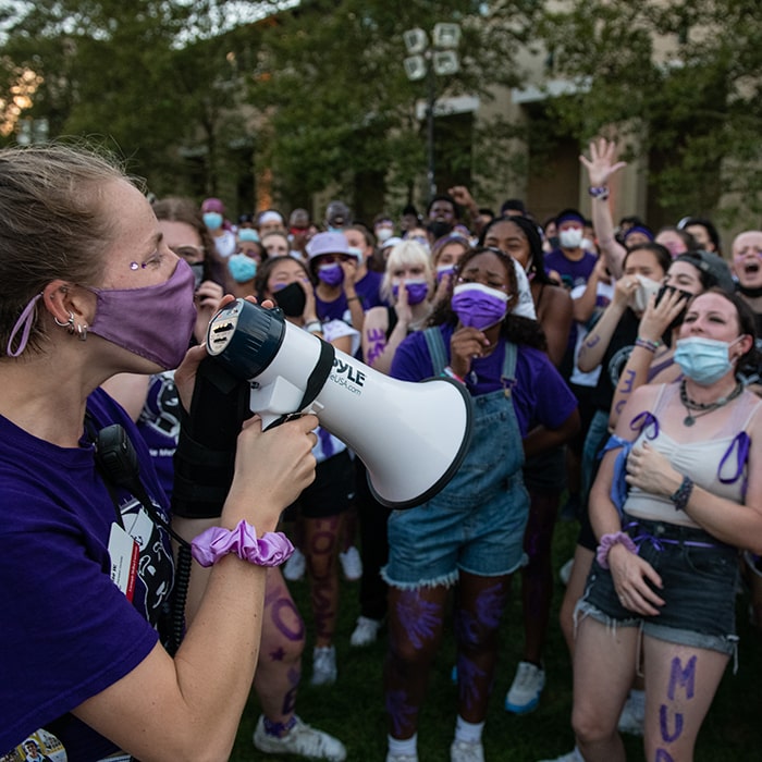 students dressed in purple during housewars