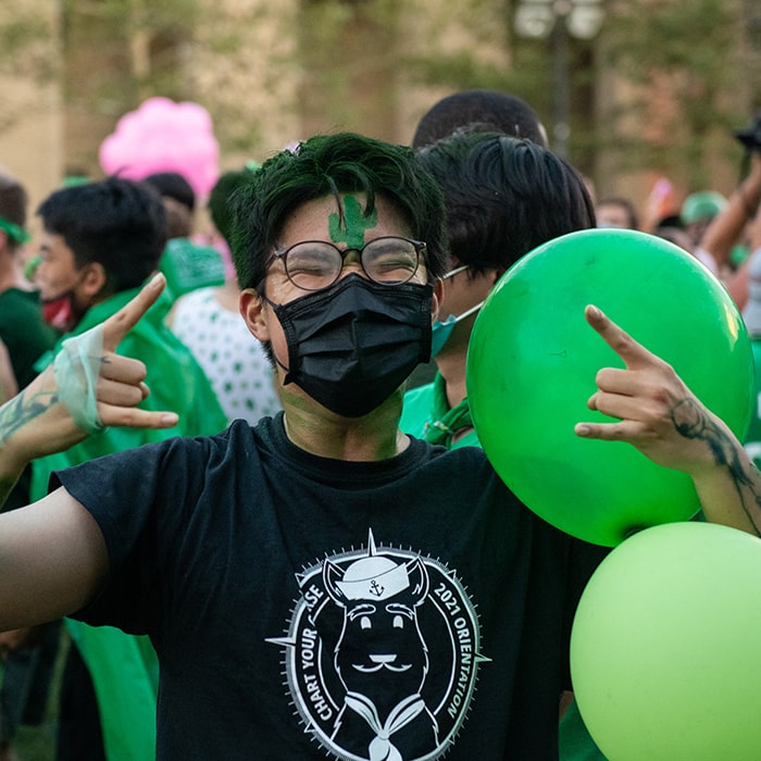 student wearing green during Housewars