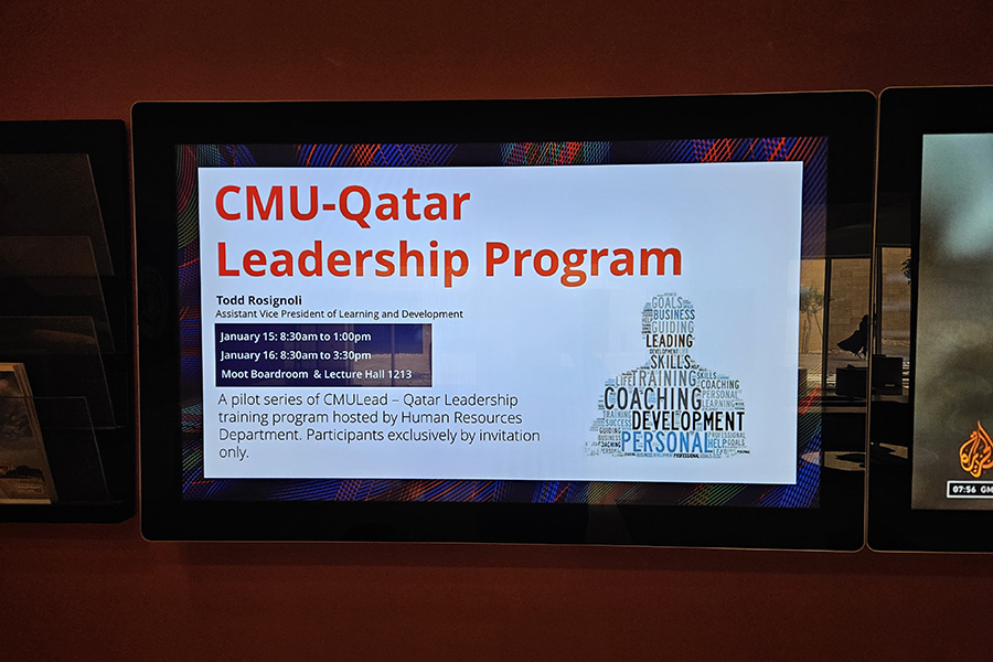 CMU-Q Leadership Program title slide projected on screen in Qatar