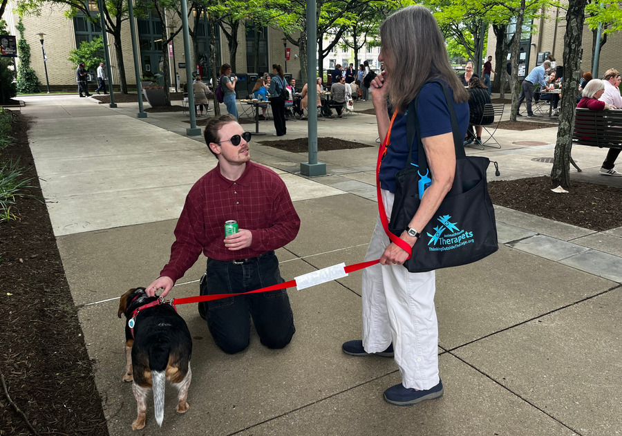 Therapy dog visit at the 2026 CMU Community Picnic