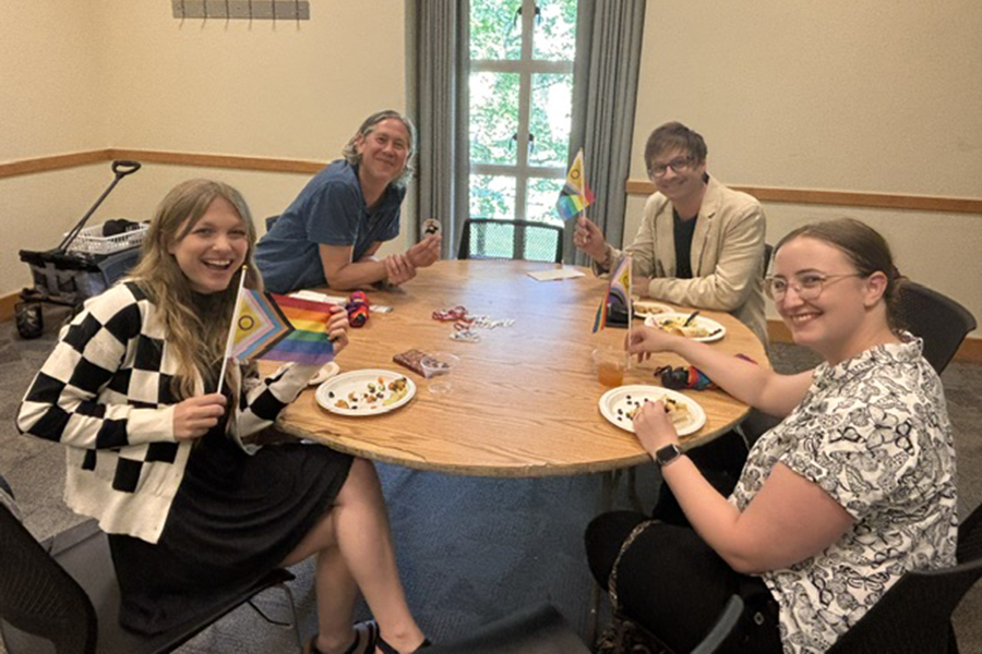 Group of attendees seated at table during Pride Lunch