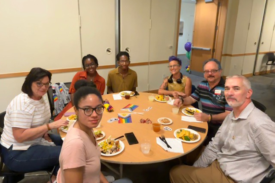 Group of attendees seated at table during Pride Lunch