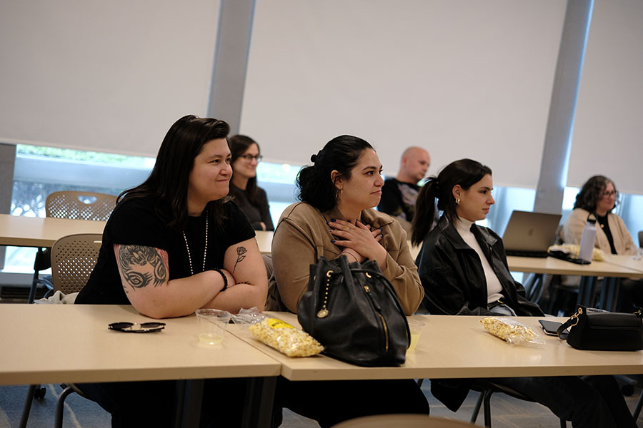Participants listening to speaker at storytelling event
